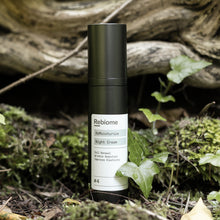Ladda upp bild till gallerivisning, Product shot of ReMoisturize – Night Cream standing on forest floor in front of a trunk with moss
